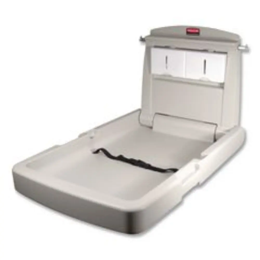 Beige changing table with open storage and black strap