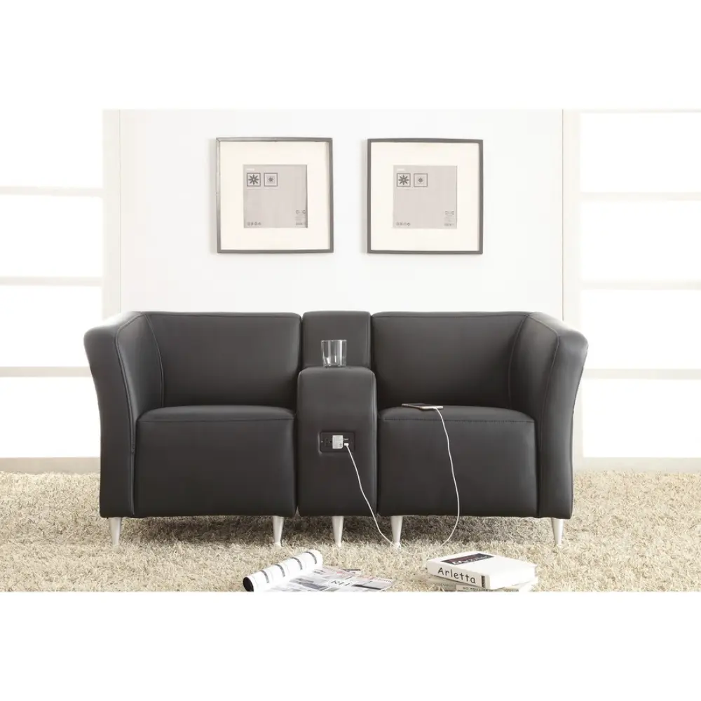 Power outlet with two USB ports and a standard socket mounted on brown fabric