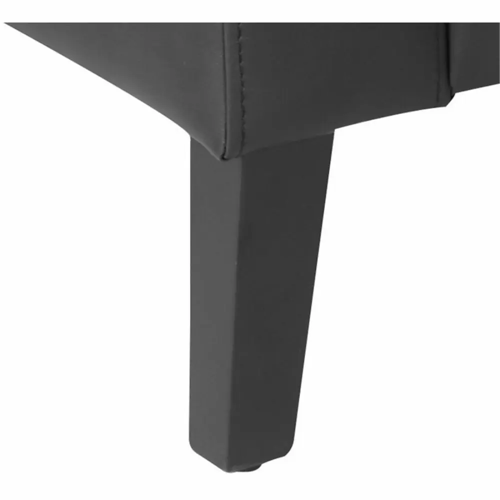 Front view of a black leather upholstered armchair with wide arms and low back