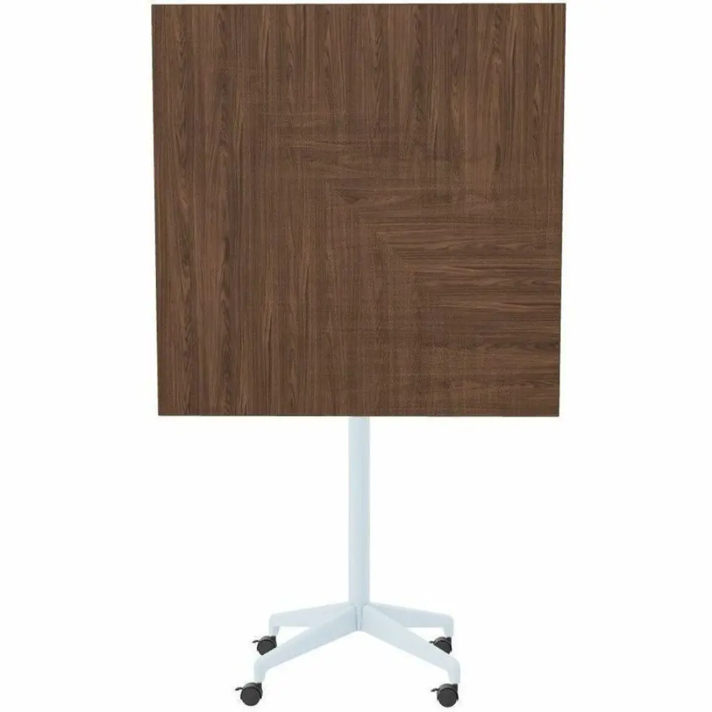 Side view of a brown wood panel attached to a gray metallic stand with a small tray