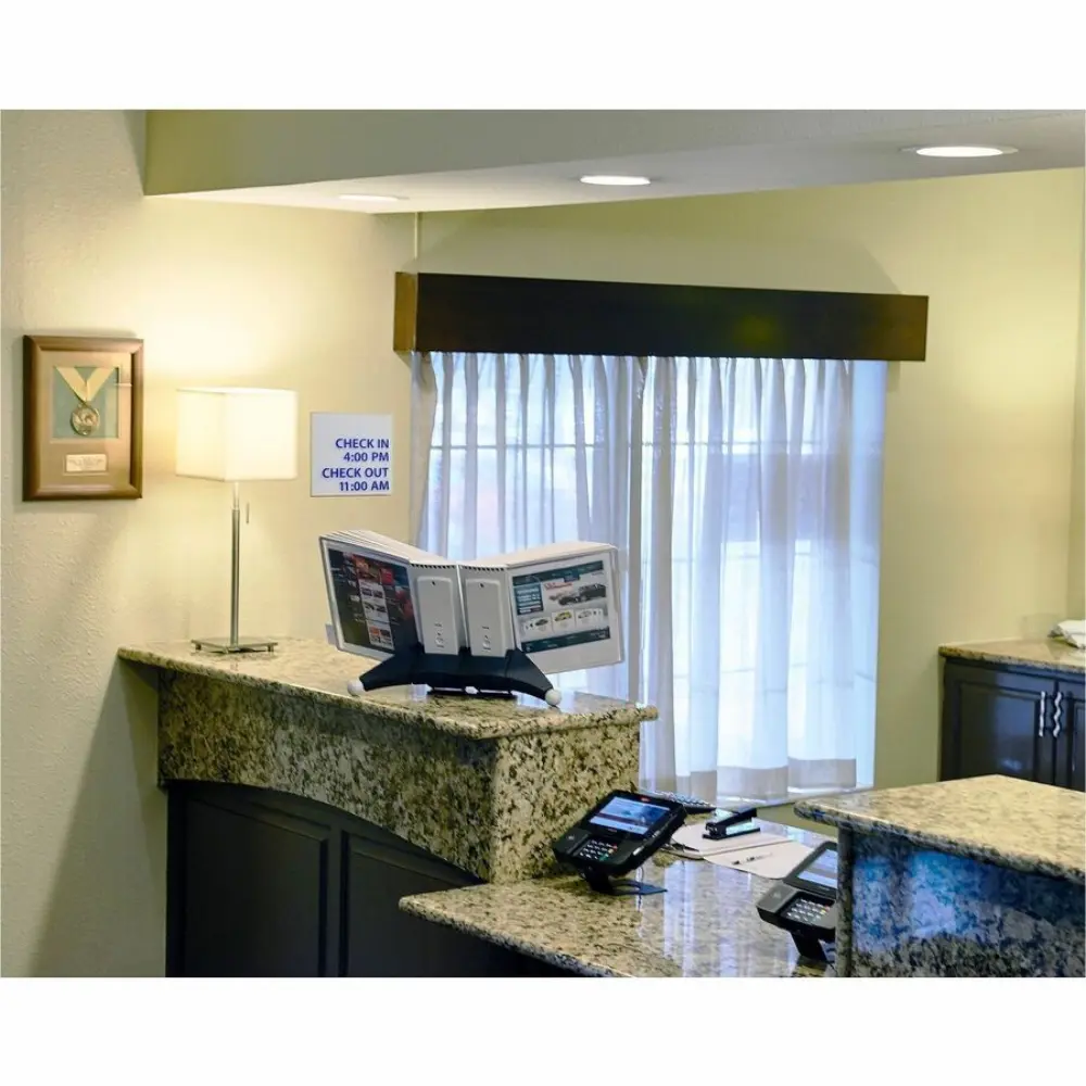 blue and white display panels on stand showcasing brochures