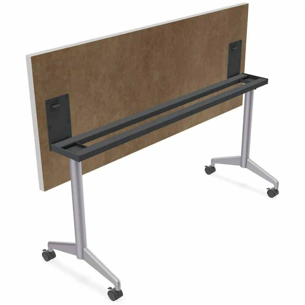 Simple rectangular white desk top with metal legs and wheels.