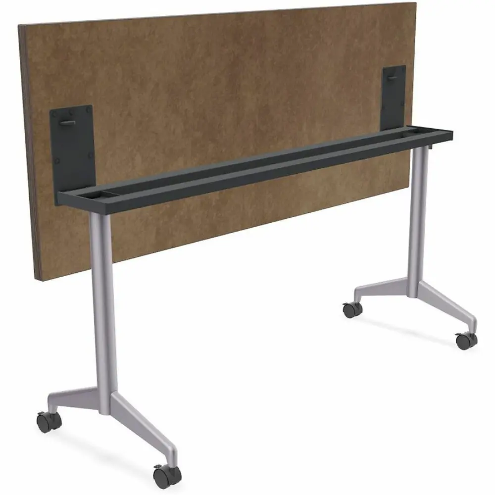 A simple light wood desk with metal legs and wheels, front view
