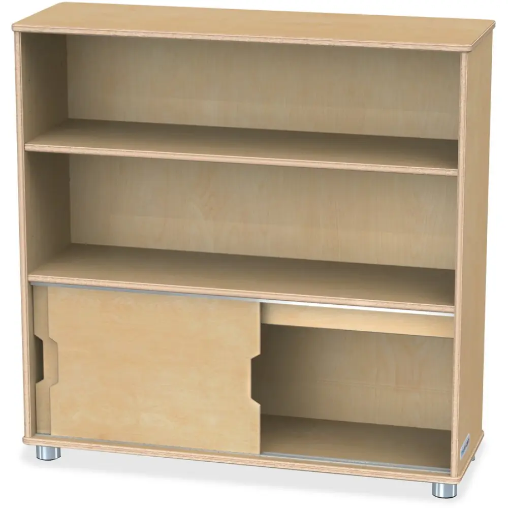 Wooden modular cabinet with a counter-height top and storage compartments, in a showroom.