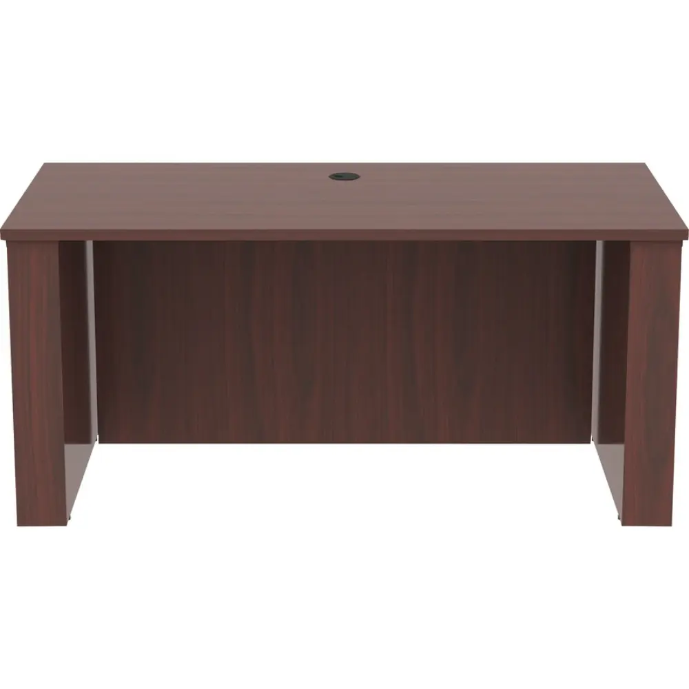 Front view of a compact wooden desk with cable grommet