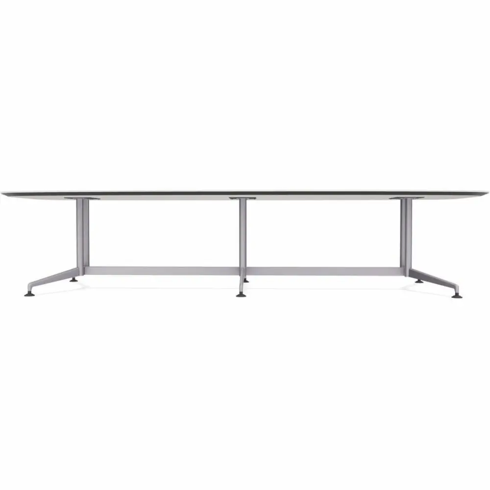 Under view of the base of a white oval conference table with multiple metal legs.