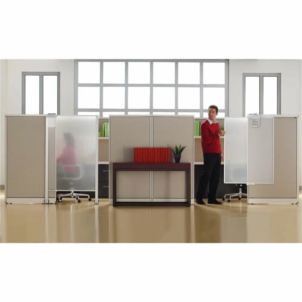 Office cubicles and a frosted panel with a person behind it
