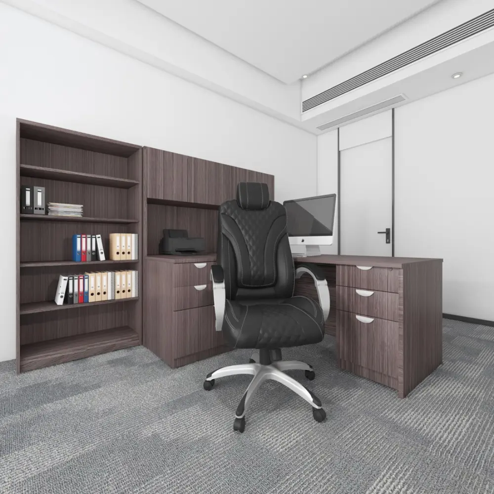 Close-up of black quilted office chair with silver base and height control lever