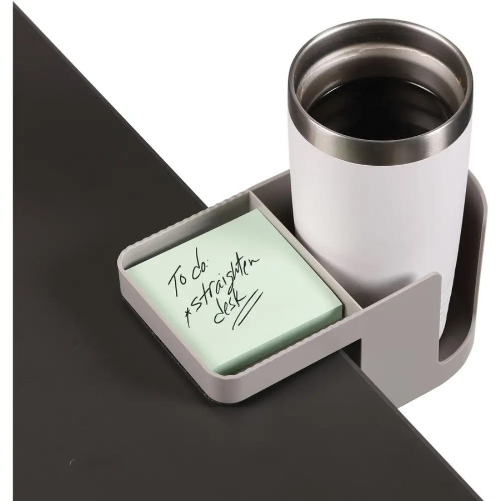 Close-up of a desk arm with a clip-on organizer holding a marker and notes