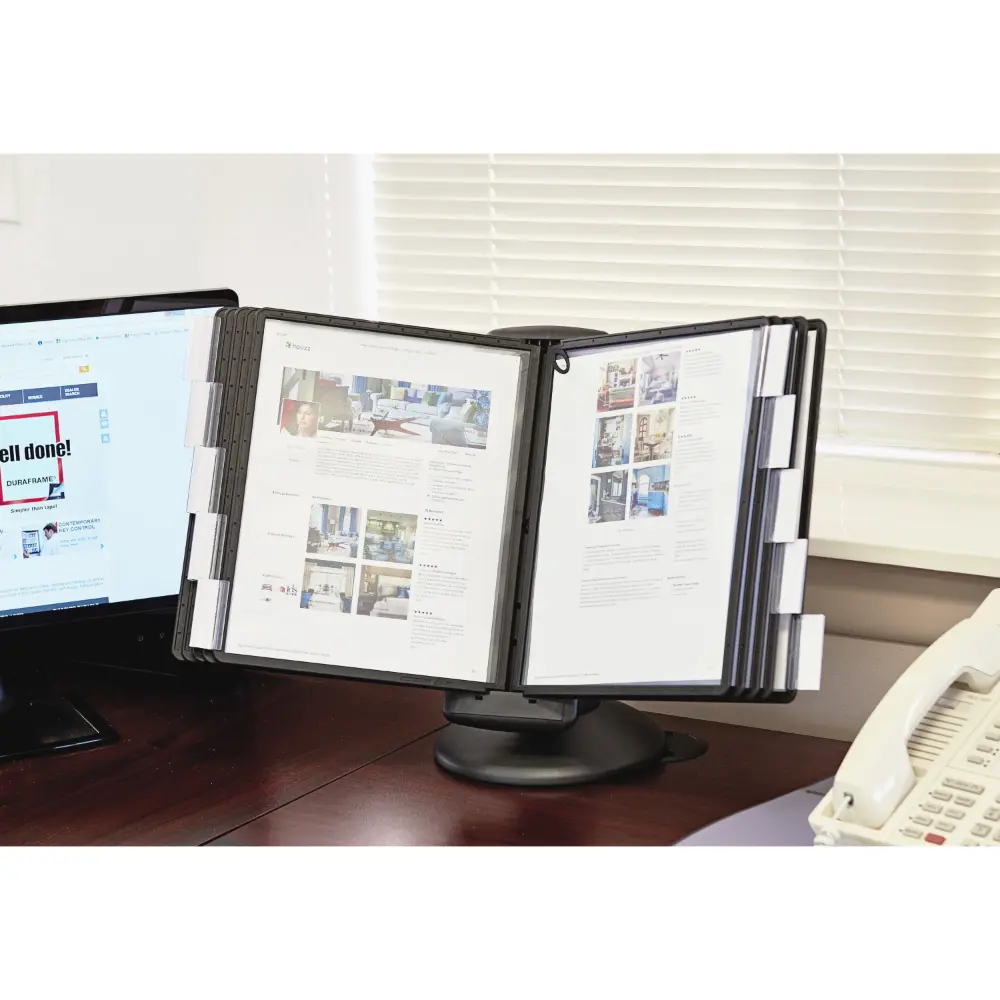 A set of four panel binders on a stand displaying documents