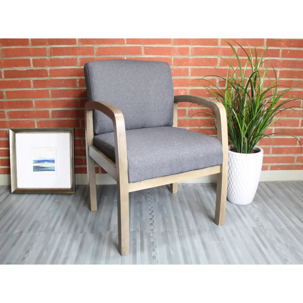 Back of gray upholstered chair with wooden frame