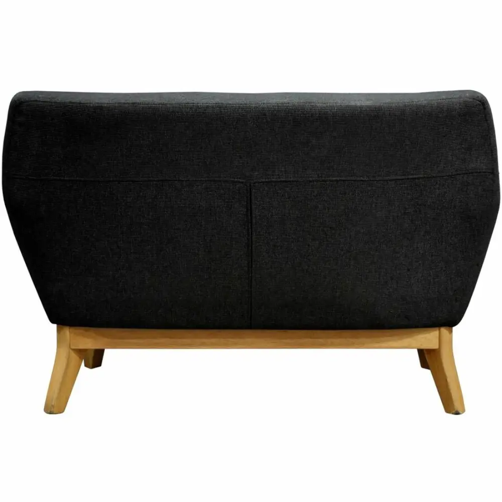 A side view of a single-seater dark gray upholstered chair with wooden legs.