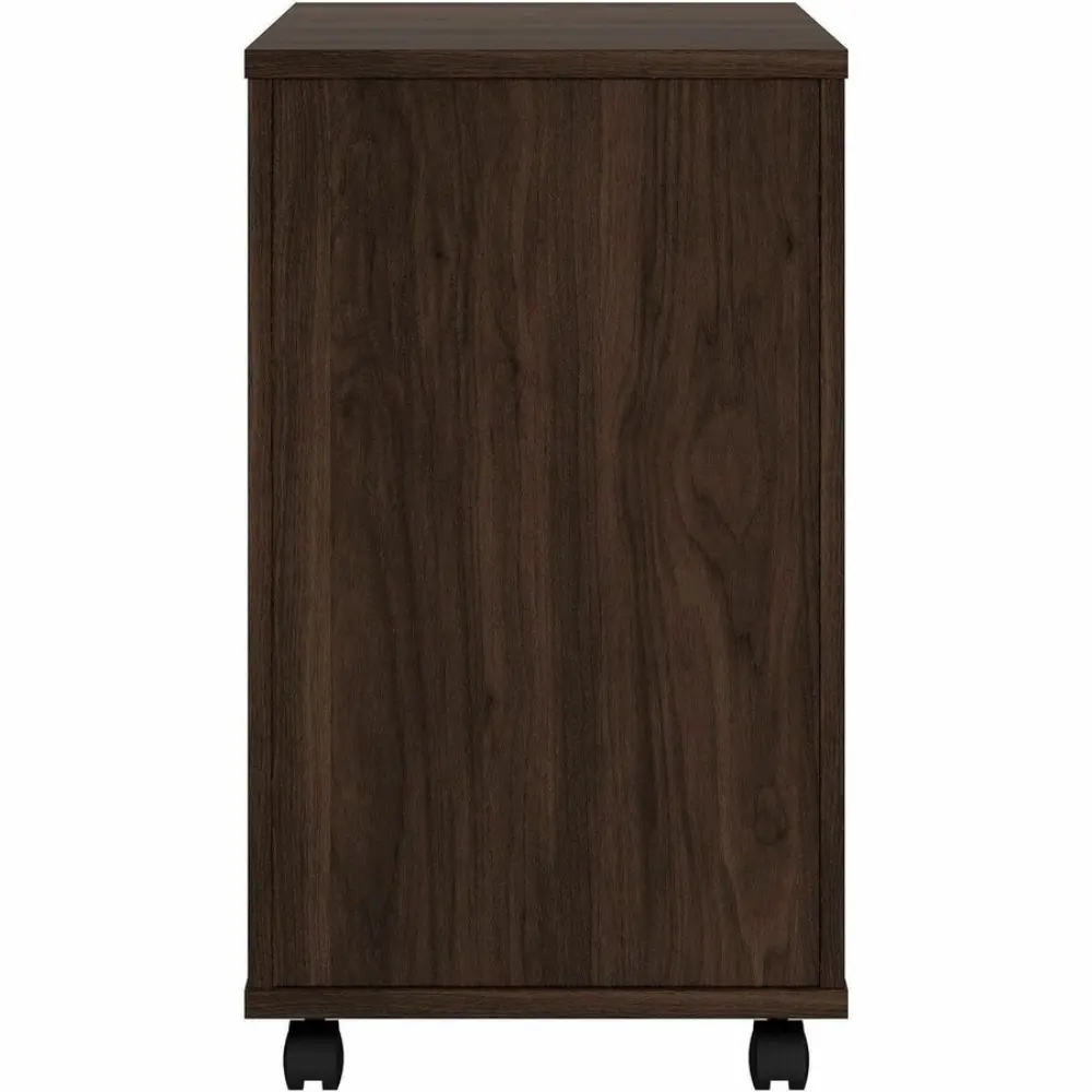Internal view of a dark wood pedestal with three drawers and a black drawer slide