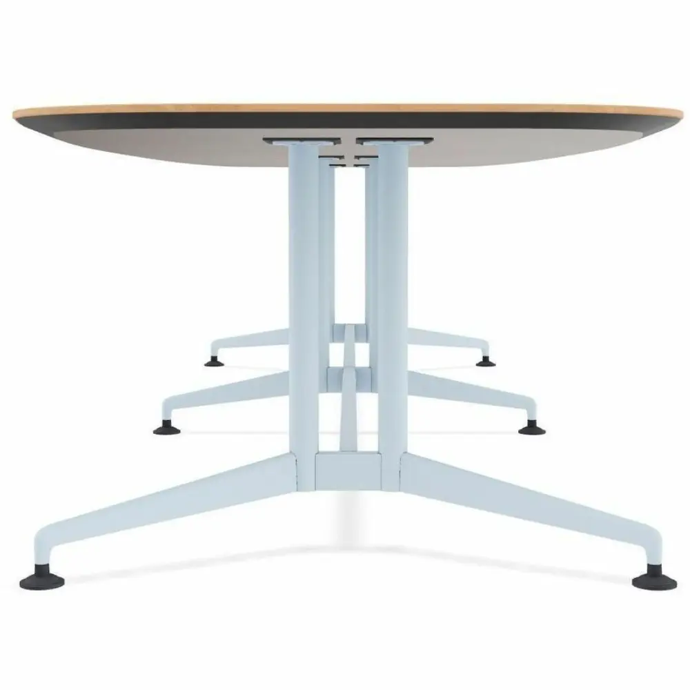 Close-up of the table top with light wood grain.