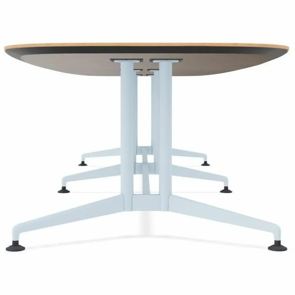 Top of a wooden oval conference table surface with rounded ends