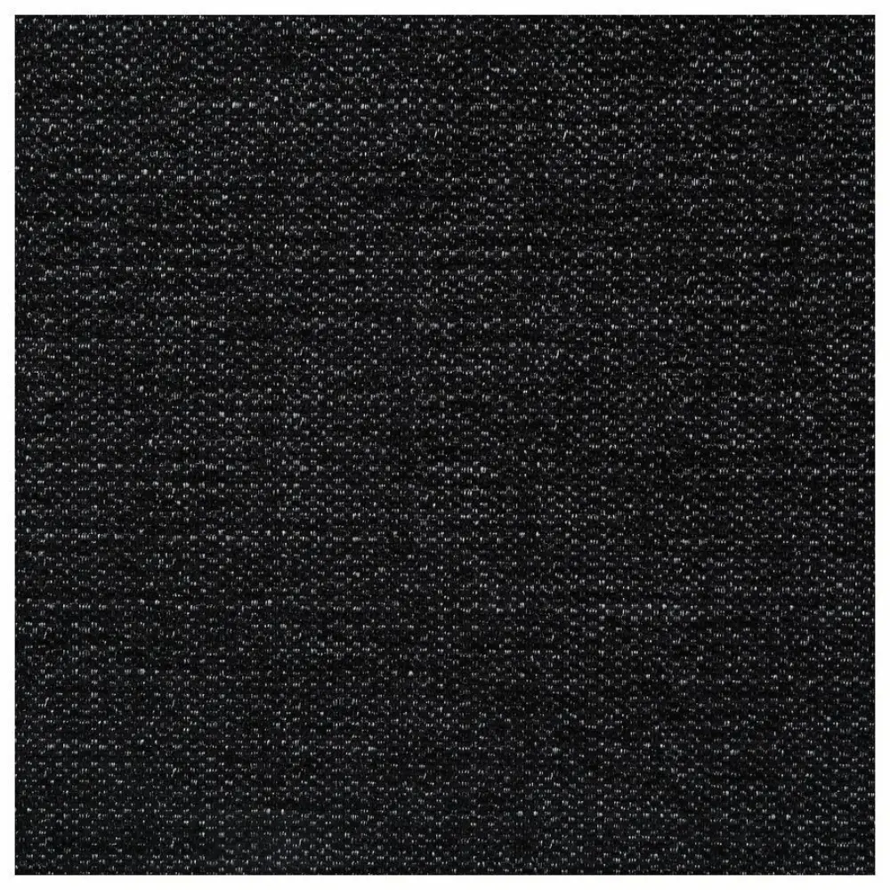 Armchair with dark fabric upholstery and wooden legs, side view