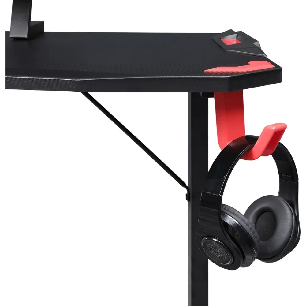 Desk with dual monitor setup and raised shelf