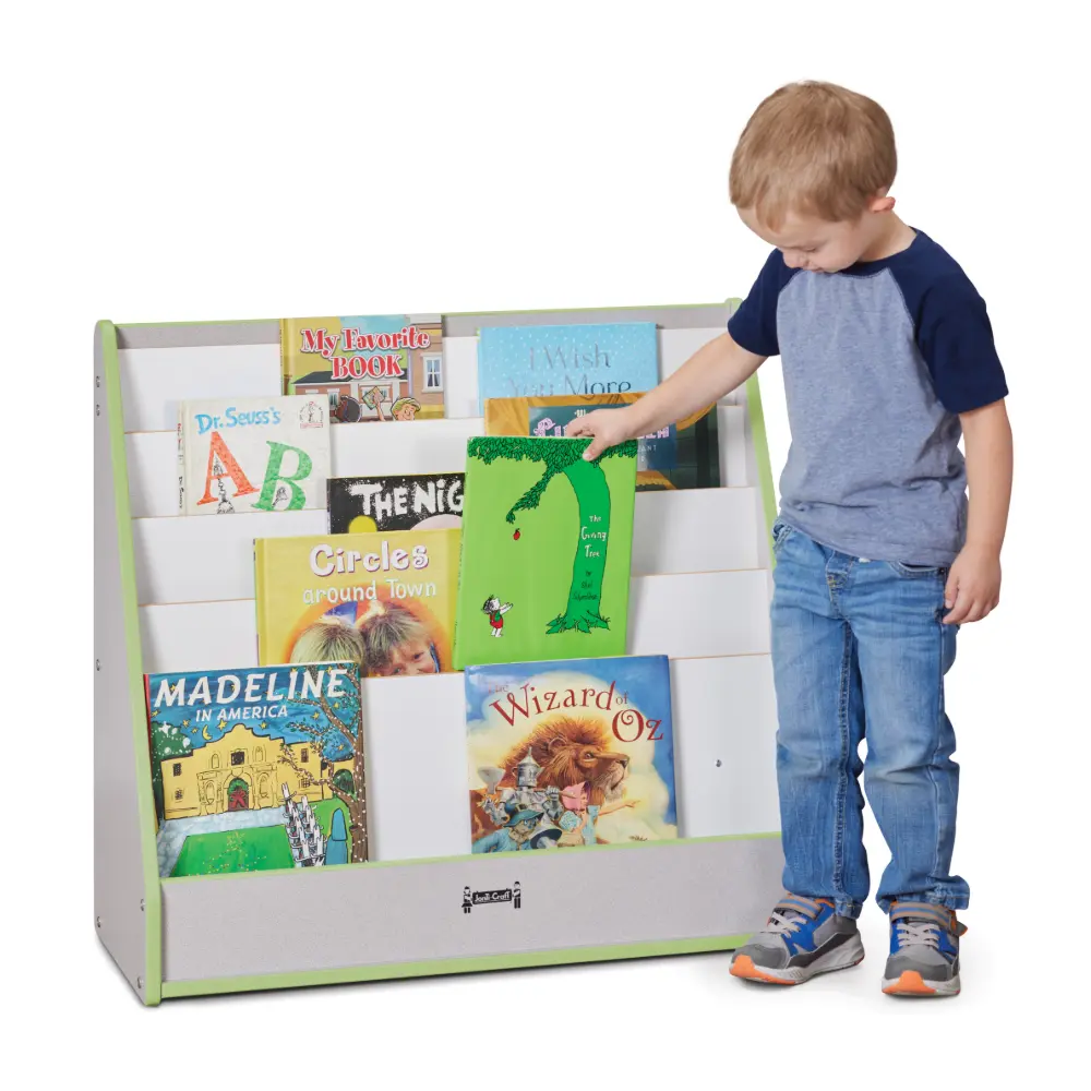 Side view of a white and green wooden bookshelf book rack displaying children's books.