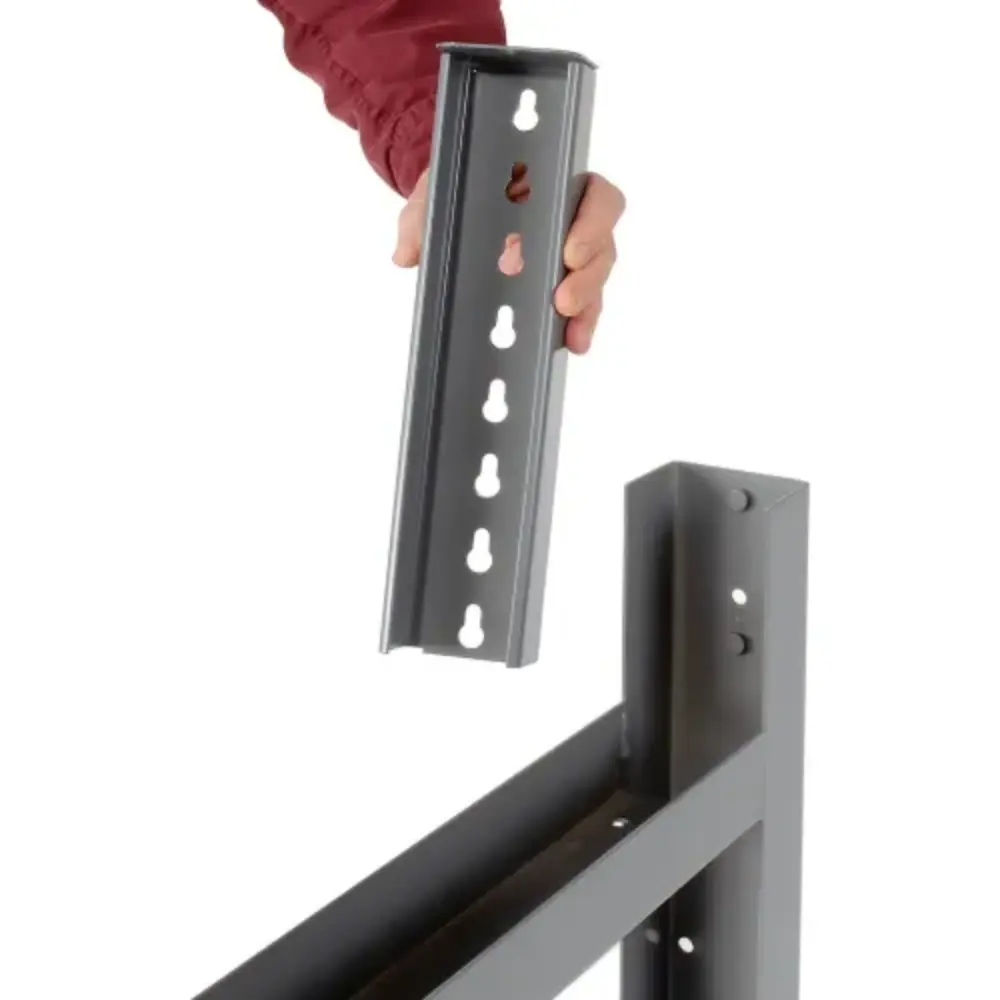 Person holding a column insert with multiple holes for adjustment
