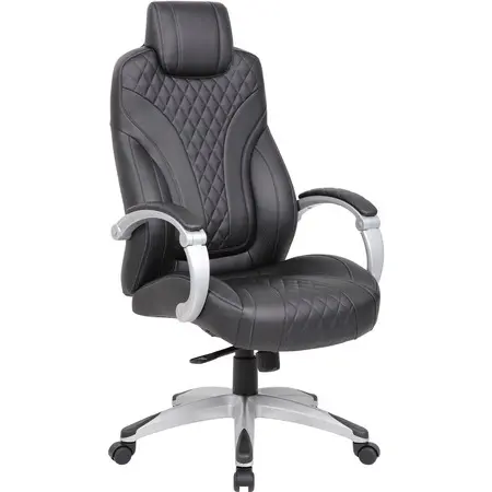 Ergonomic black office chair with quilted pattern and silver armrests in a modern office setup