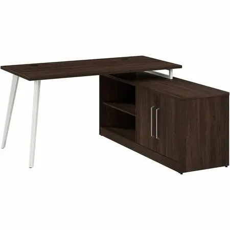 Modern L-shaped office desk with dark wood finish and white angled legs, along with an attached storage cabinet and a black office chair nearby.