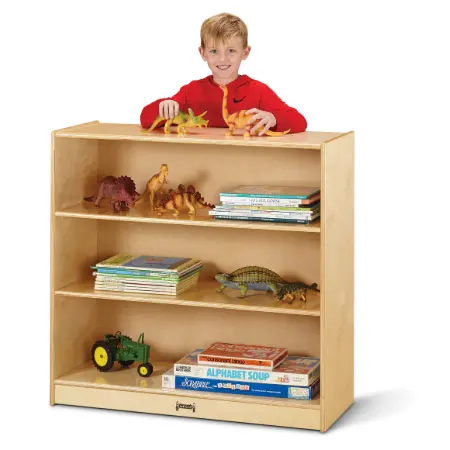 Wooden kid’s bookshelf filled with dinosaur toys and books on three shelves.